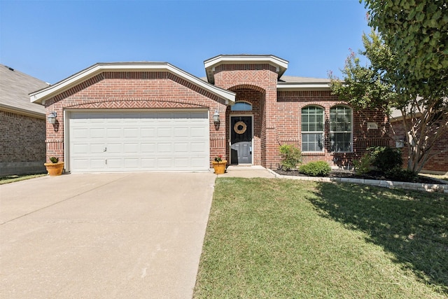 view of front of house with a garage and a front lawn