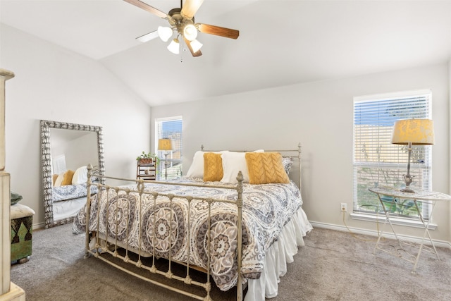 bedroom featuring carpet flooring, ceiling fan, lofted ceiling, and multiple windows