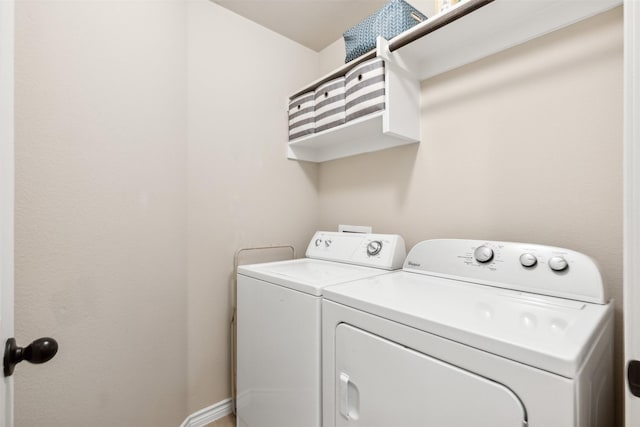 laundry room featuring washing machine and dryer