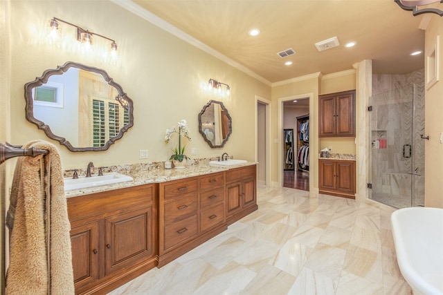 bathroom with plus walk in shower, ornamental molding, and vanity