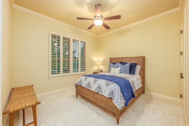 bedroom featuring ornamental molding, ceiling fan, and carpet flooring