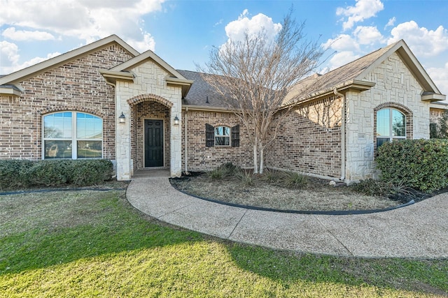 view of front of home with a front yard