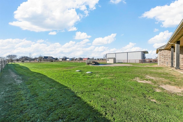 view of yard with an outdoor structure