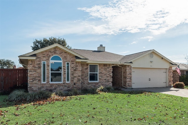 ranch-style house featuring a front lawn and a garage