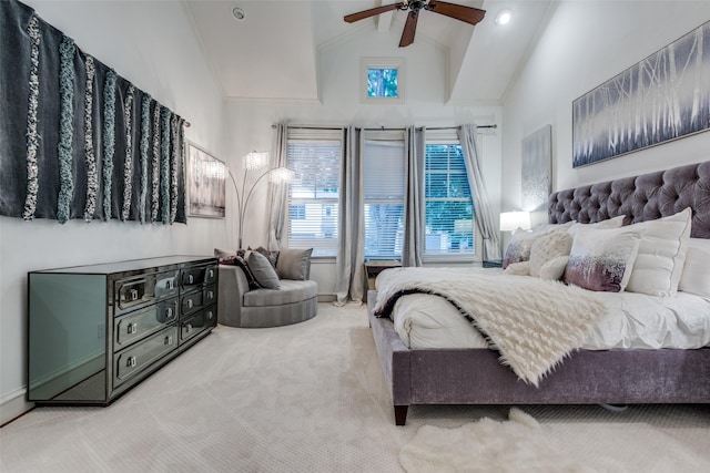 bedroom featuring ceiling fan, light colored carpet, and high vaulted ceiling