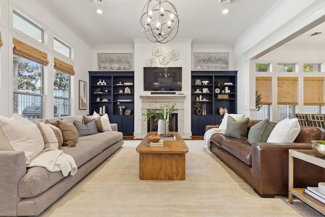 living room featuring a notable chandelier, light wood-type flooring, and ornamental molding