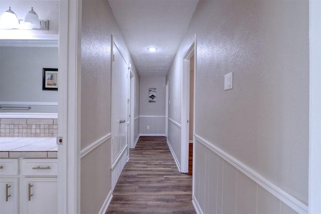 corridor featuring light hardwood / wood-style floors