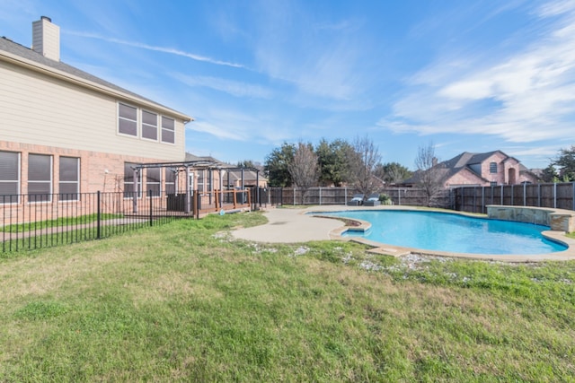 view of swimming pool featuring a lawn, a patio area, and a pergola