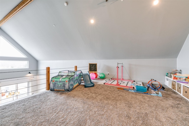 recreation room featuring vaulted ceiling with beams and carpet floors