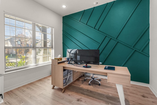 office with hardwood / wood-style flooring