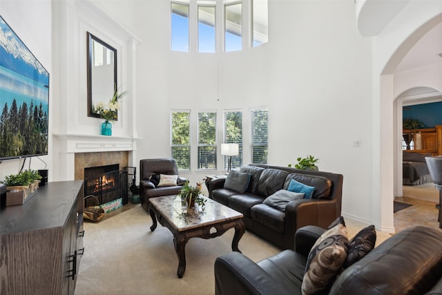 living room with a high ceiling