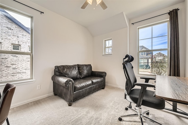 carpeted office featuring ceiling fan, a healthy amount of sunlight, and vaulted ceiling