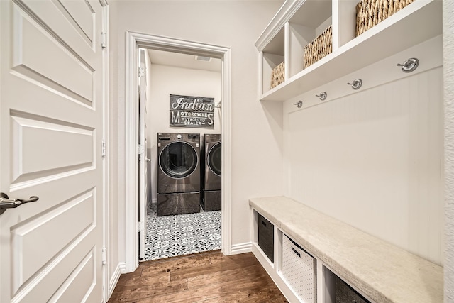 mudroom with washing machine and dryer and dark hardwood / wood-style flooring