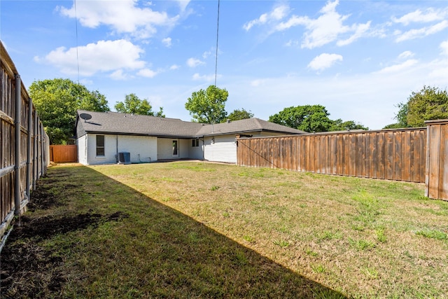 view of yard featuring central AC