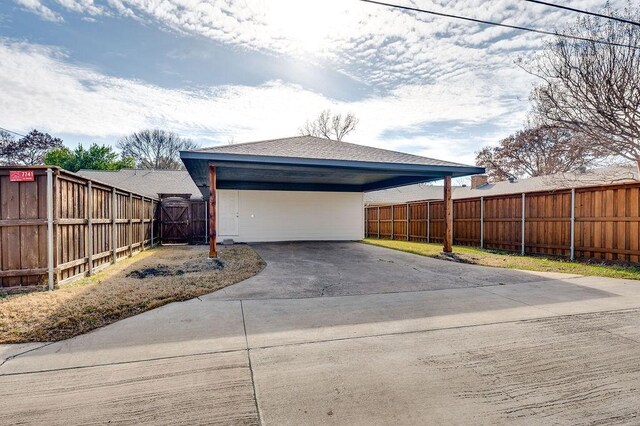 garage with a carport