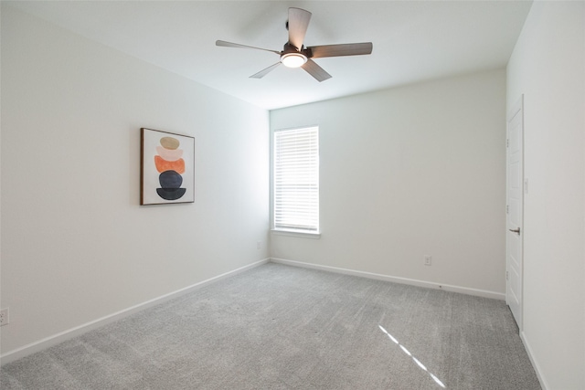 unfurnished room with light carpet and ceiling fan