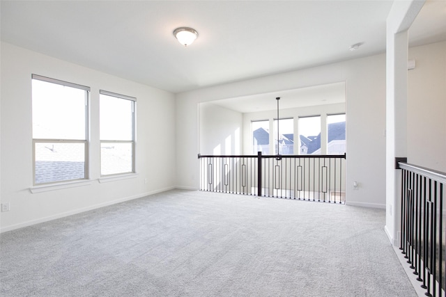 spare room featuring carpet flooring