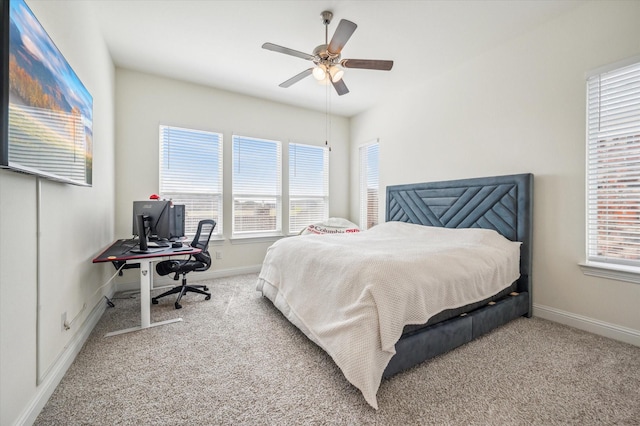 bedroom with ceiling fan and carpet floors