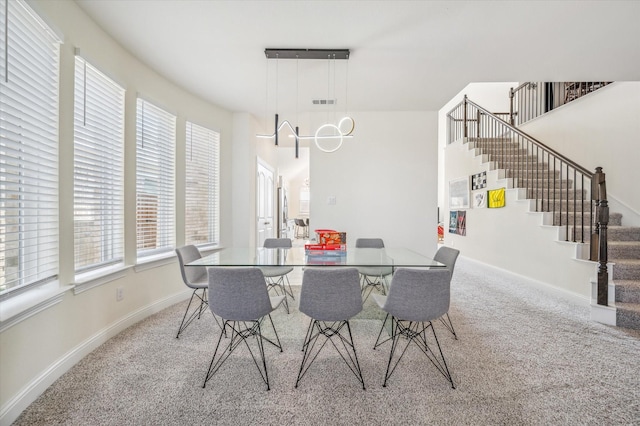 dining area with carpet floors