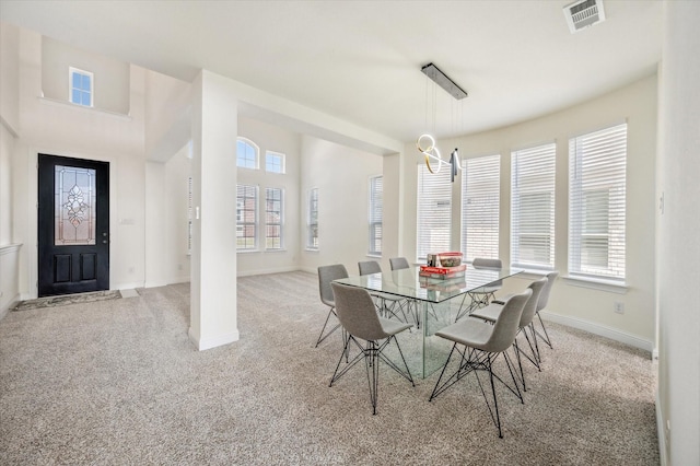 view of carpeted dining room