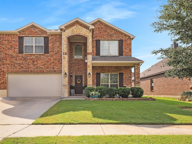 view of front of property featuring a garage and a front lawn