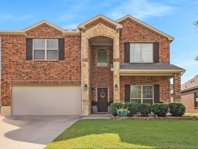 view of front facade featuring a front yard and a garage