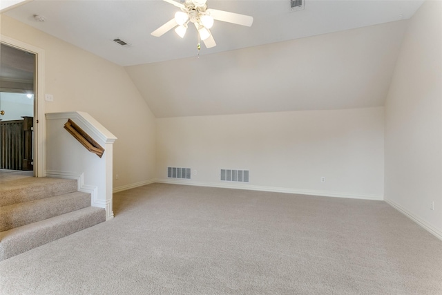 bonus room featuring ceiling fan, carpet floors, and vaulted ceiling