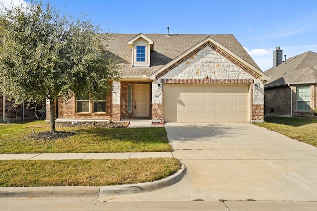 view of front facade with a garage and a front lawn