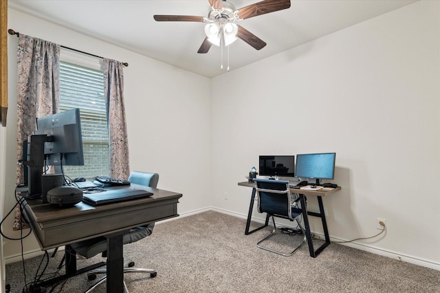 carpeted home office with ceiling fan