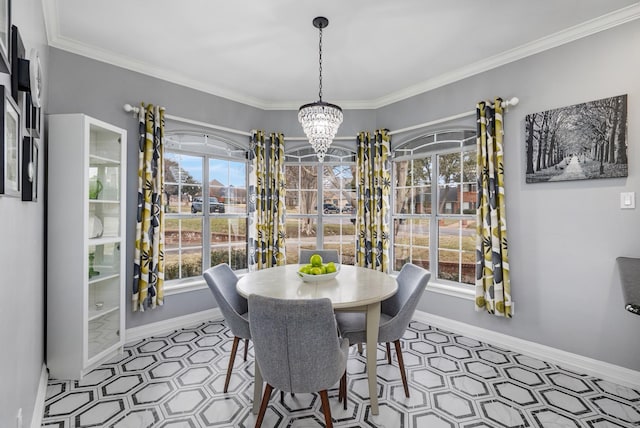 dining area featuring crown molding and an inviting chandelier