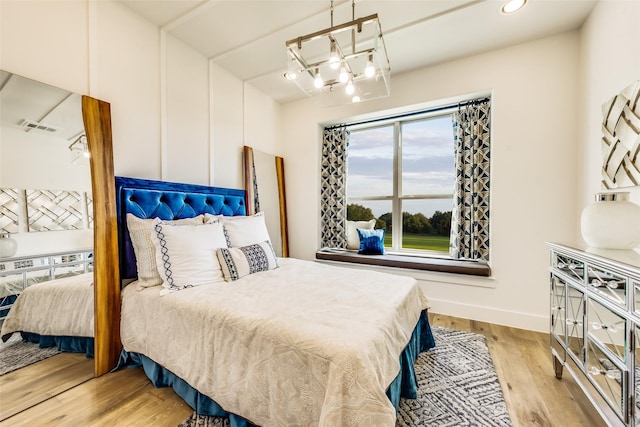 bedroom featuring light wood-type flooring