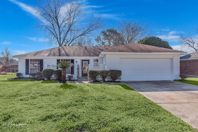 ranch-style home with a front lawn and a garage