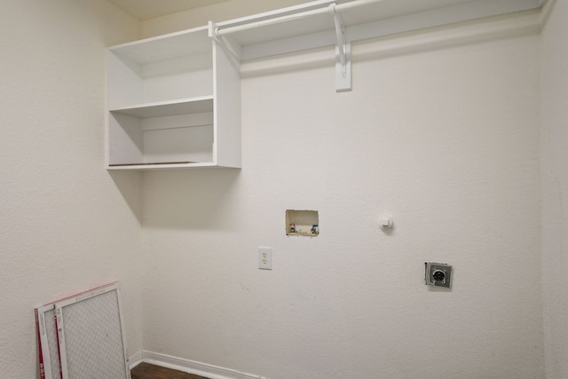 clothes washing area featuring washer hookup, hookup for an electric dryer, and gas dryer hookup