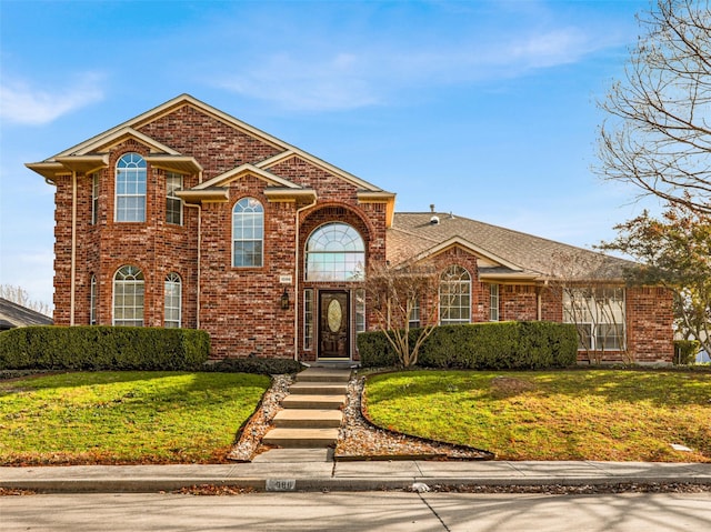 front of property featuring a front lawn