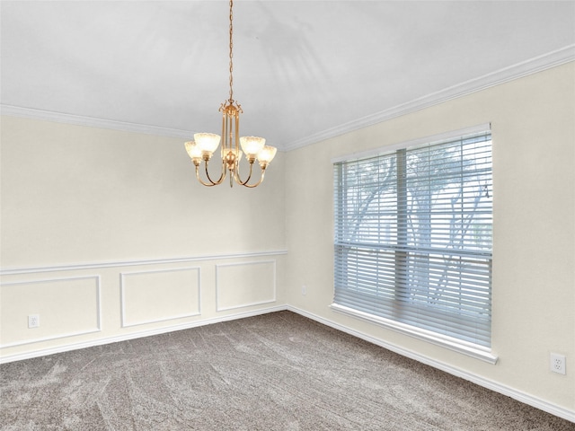 carpeted empty room featuring an inviting chandelier and crown molding