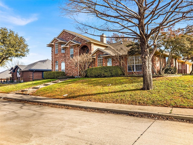 view of front of property with a front yard