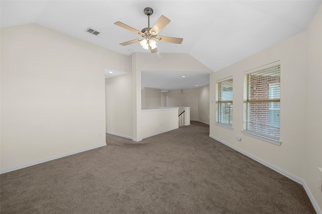 unfurnished living room with lofted ceiling, ceiling fan, and carpet