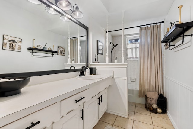 bathroom featuring shower / tub combo with curtain, vanity, and tile patterned flooring