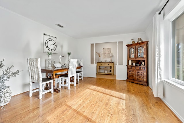 dining area featuring light wood-type flooring