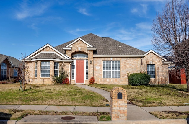 view of front of home with a front yard