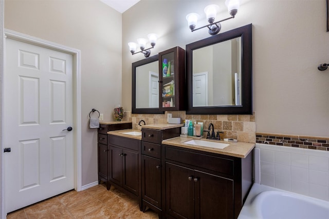 bathroom featuring a bathing tub and vanity