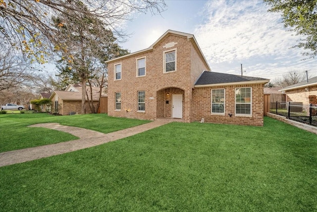 view of front of home with a front lawn