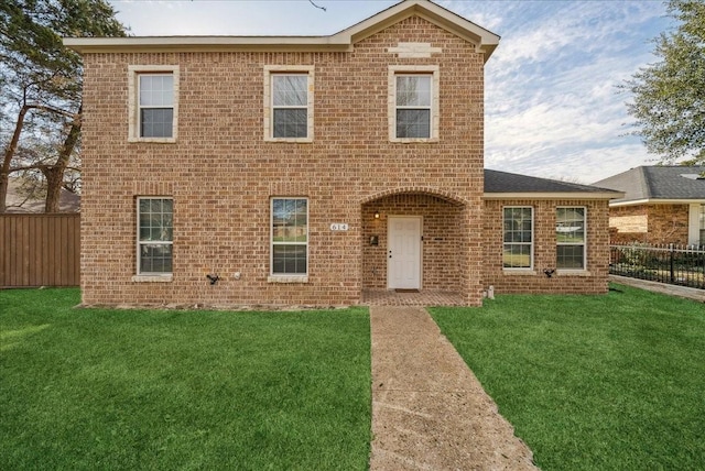 view of front of property with a front lawn