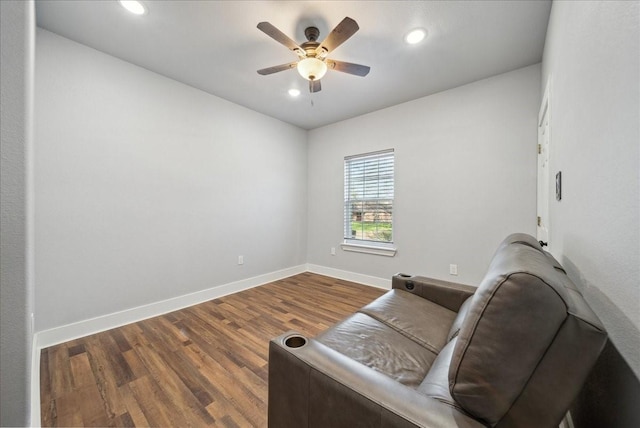 sitting room featuring hardwood / wood-style flooring and ceiling fan