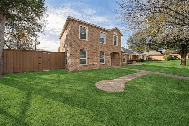 view of front of house with a front lawn