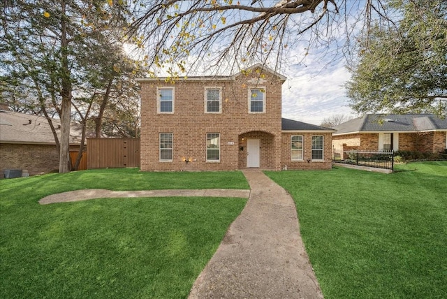 view of front of home with a front lawn