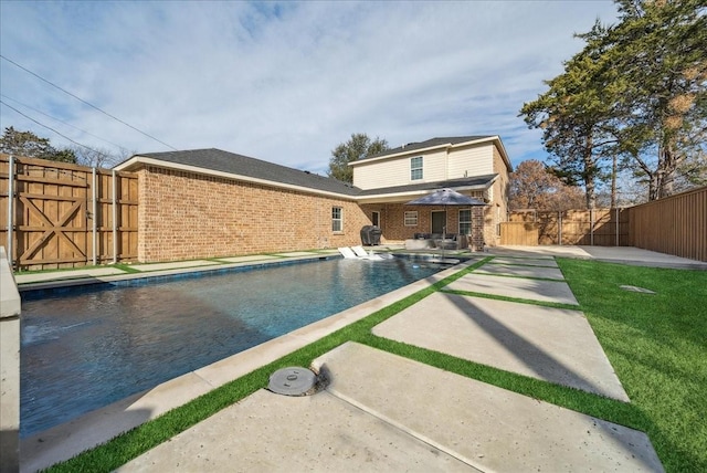 view of pool featuring a patio area