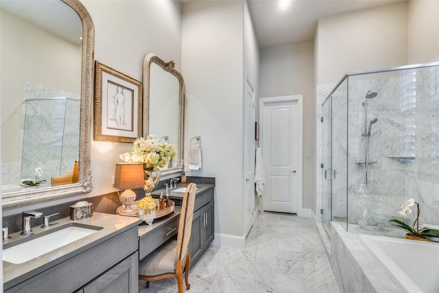 bathroom featuring separate shower and tub and vanity