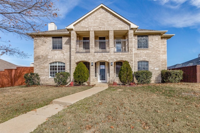 view of front facade with a front lawn