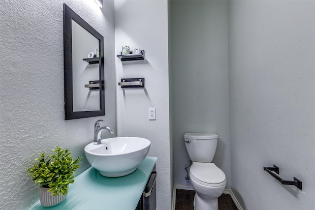 bathroom with sink and toilet